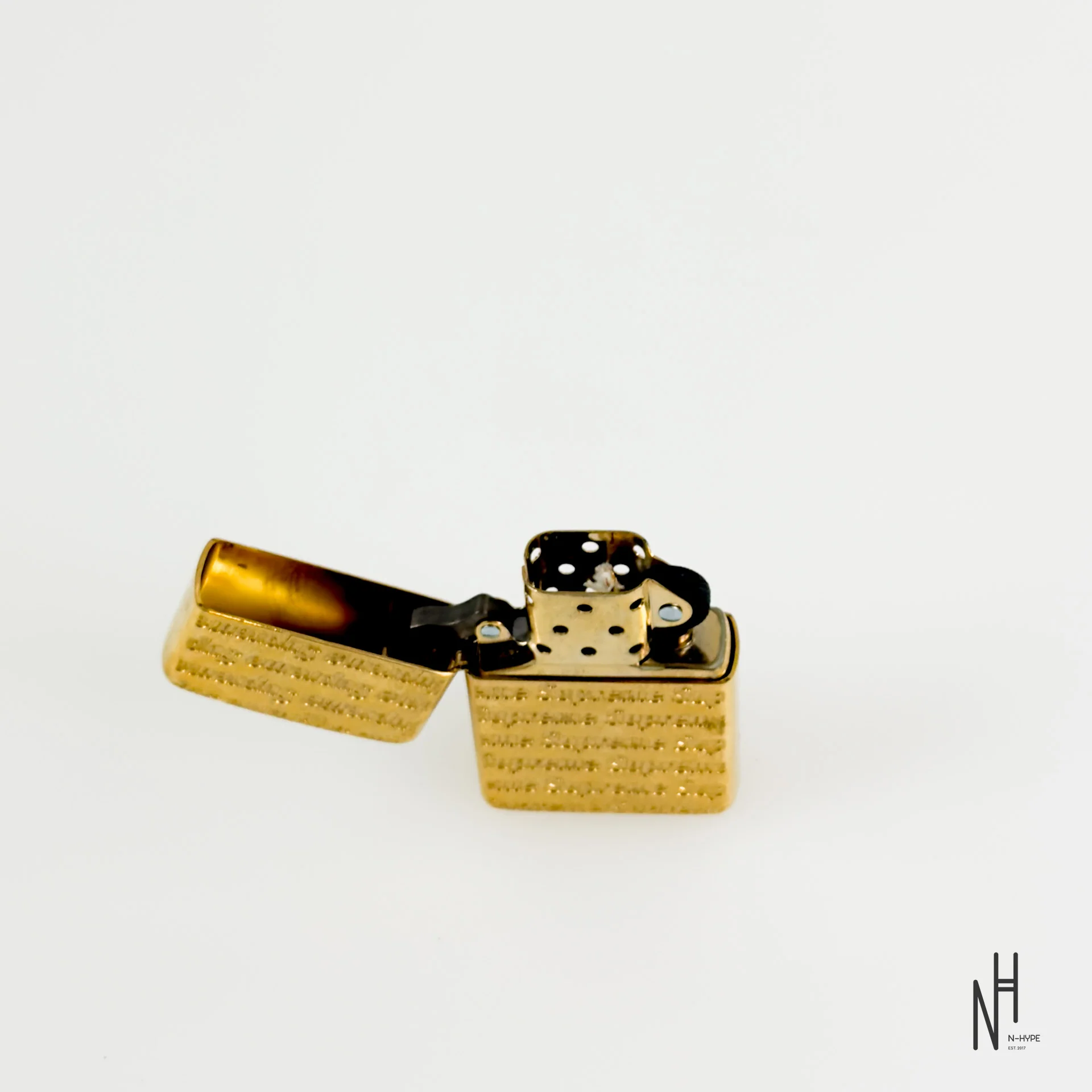Supreme Repeat Engraved Zippo Gold - Image 7